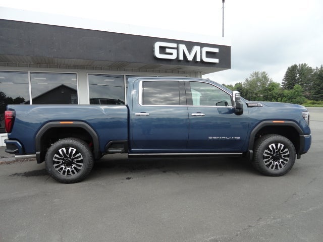 2026 GMC Sierra 3500 HD Denali Ultimate in Downpour Metallic — front three-quarter view