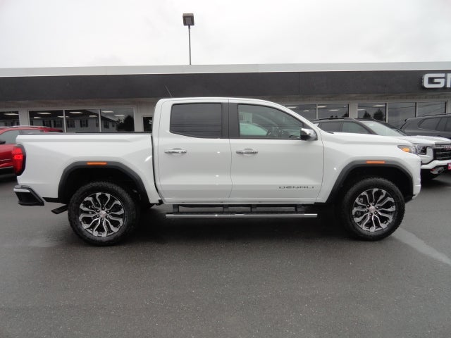2026 GMC Canyon Denali in Summit White — front three-quarter view