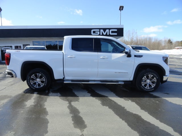 2026 GMC Sierra 1500 SLE in Summit White — front three-quarter view