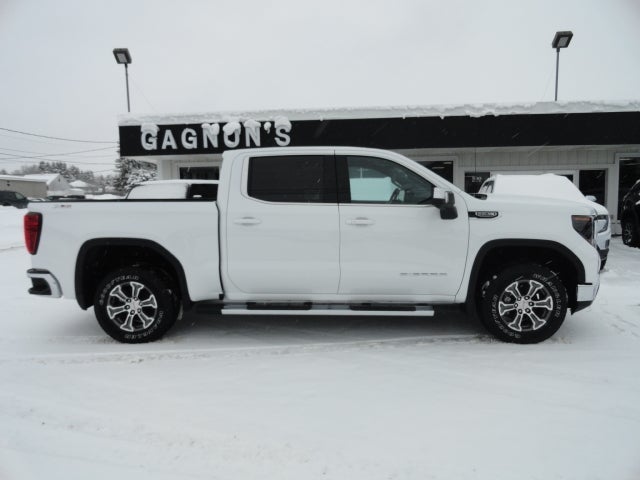 2026 GMC Sierra 1500 SLE in Summit White — front three-quarter view